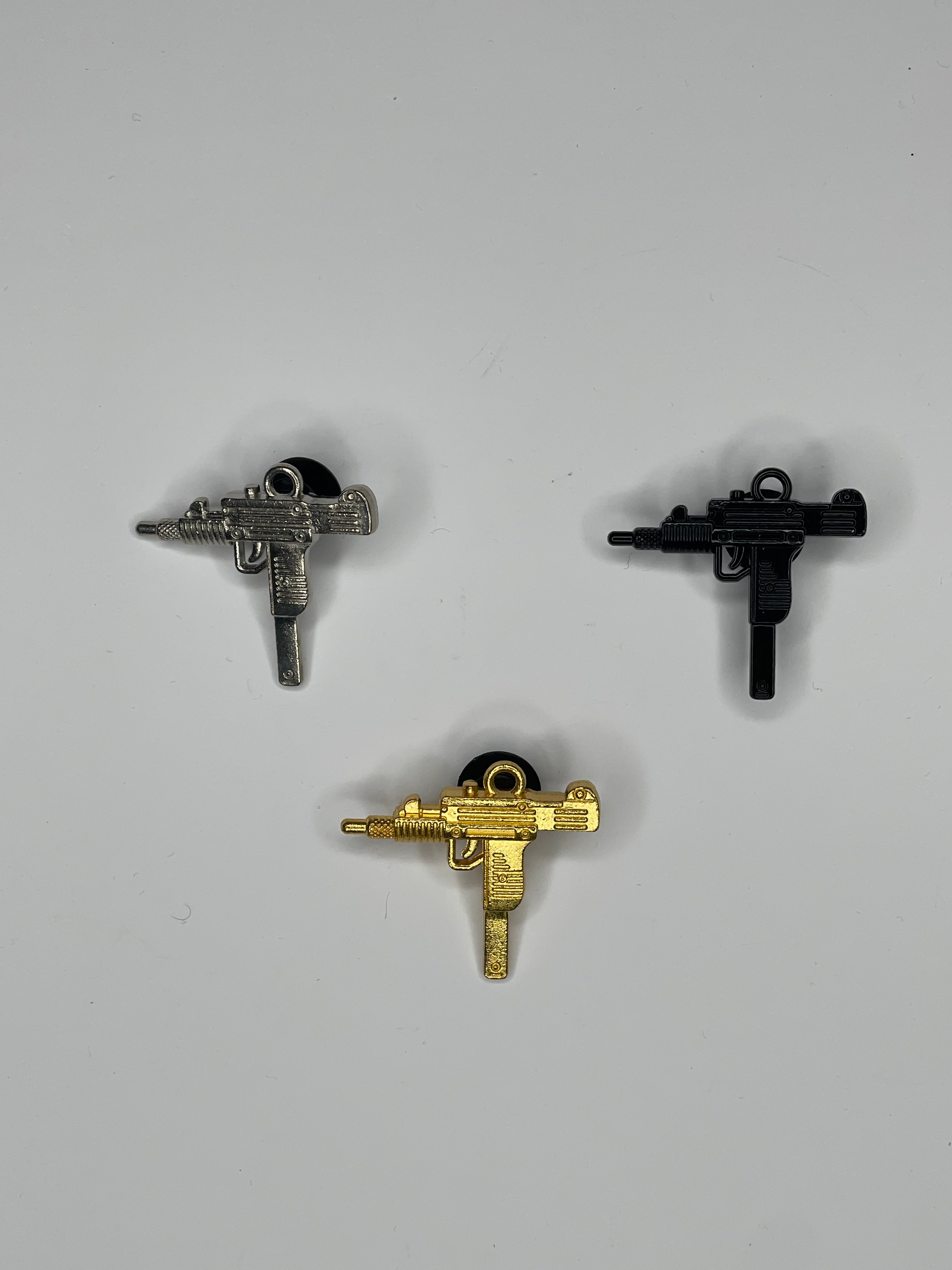 Gun croc charms hot sale